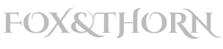 FOX & THORN logo in gray on a white background